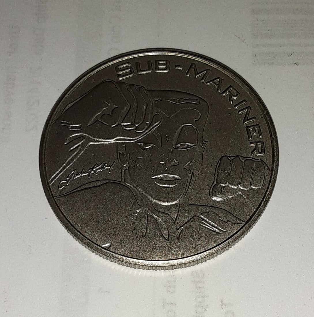 Sub-Mariner Marvel Comics Uncirculated 38mm 1999 Collector Medal: Sub-Mariner Marvel Comics Uncirculated 38mm 1999 Collector Medal This is a 1999 Marvel Comics collector medal featuring Prince Namor, The Sub-Mariner. The medal is small size, measuring 38 mm in diame