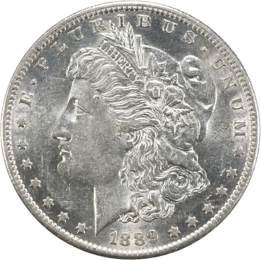 Morgan Dollar 1889 San Francisco AU Grade Uncertified 90 Percent Silver Coin: Morgan Dollar 1889 San Francisco AU Grade Uncertified 90 Percent Silver Coin This 1889-S Morgan Silver Dollar is an attractive example from the San Francisco Mint. Struck from 90% silver and 10% coppe