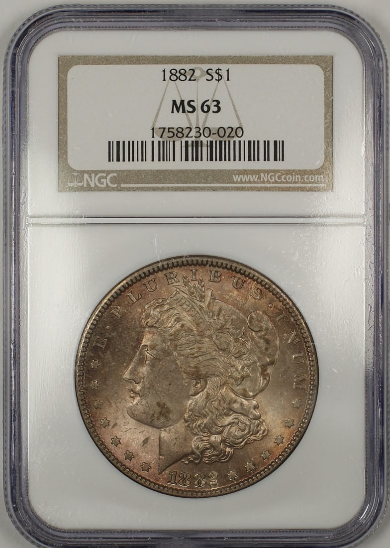 NGC MS 63 1882 Silver Morgan Dollar Toned Uncirculated Coin: NGC MS 63 1882 Silver Morgan Dollar Toned Uncirculated Coin This is an 1882 Morgan Silver Dollar $1 coin from the United States, certified by NGC with a grade of MS 63. The coin is uncirculated, featu