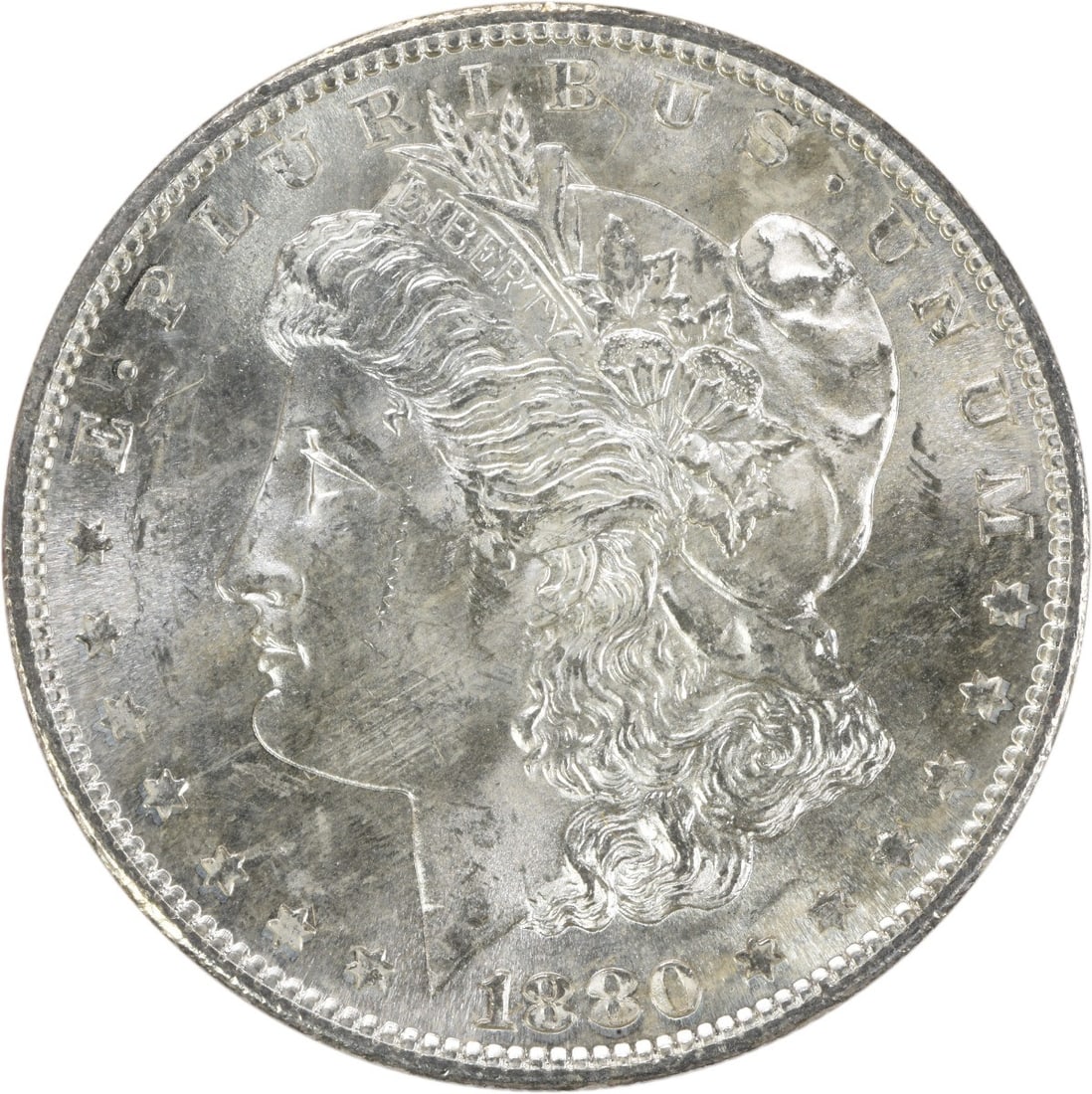 1880-S Morgan Silver Dollar Uncertified Brilliant Uncirculated: 1880-S Morgan Silver Dollar Uncertified Brilliant Uncirculated This 1880-S Morgan Silver Dollar is an uncirculated coin, showcasing the iconic design that has made it a favorite among collectors. Stru