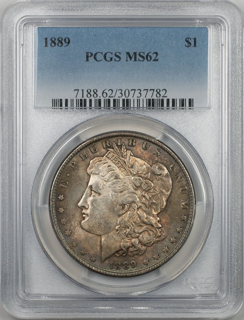 PCGS MS62 1889 Silver Morgan Dollar Toned Philadelphia Mint: PCGS MS62 1889 Silver Morgan Dollar Toned Philadelphia Mint This 1889 Morgan Silver Dollar features a PCGS certification with a grade of MS 62, indicating better quality and attractive toning. The coi