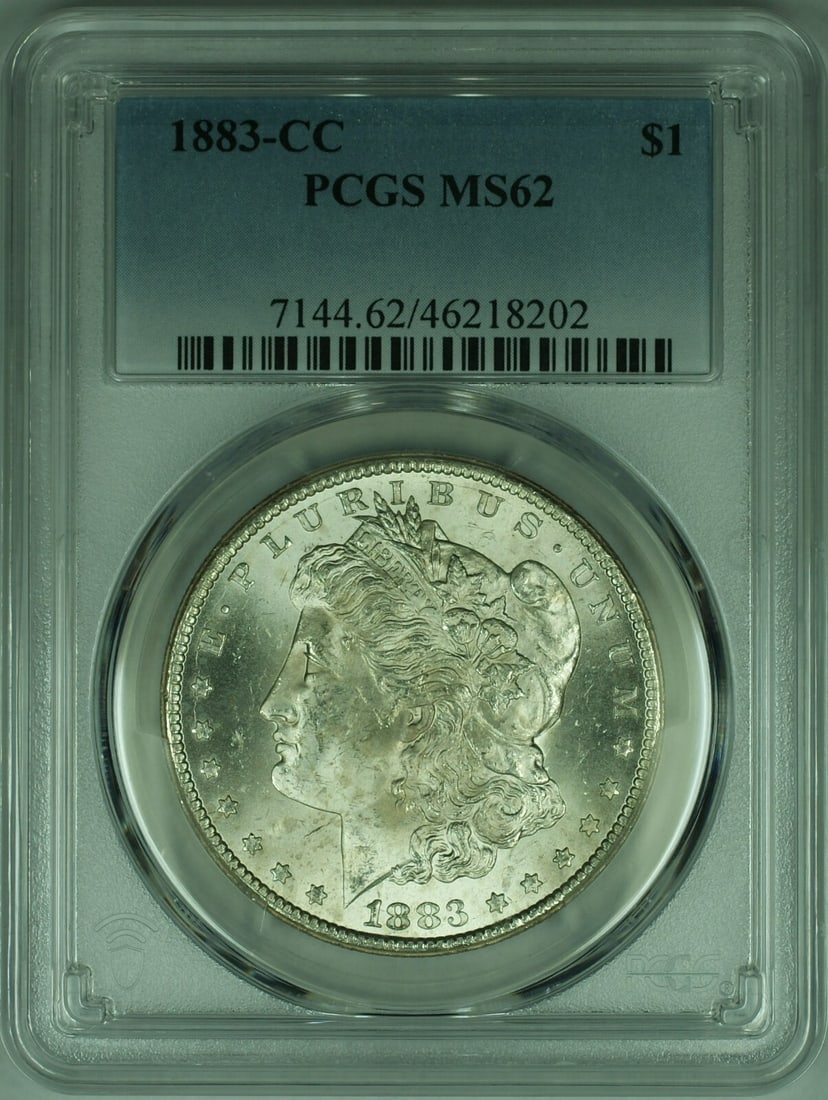 PCGS MS-62 Graded 1883 Carson City Morgan Silver Dollar: PCGS MS-62 Graded 1883 Carson City Morgan Silver Dollar This 1883-CC Morgan Silver Dollar is an uncirculated coin certified by PCGS with a grade of MS-62. Minted in Carson City, it is composed of 90%