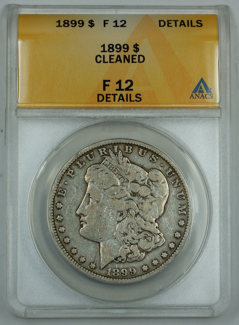 ANACS F-12 1899 Silver Morgan Dollar Philadelphia Cleaned: ANACS F-12 1899 Silver Morgan Dollar Philadelphia Cleaned This is an 1899 Morgan Silver Dollar coin graded F-12 Details by ANACS. The coin was minted in Philadelphia and is composed of silver. It has