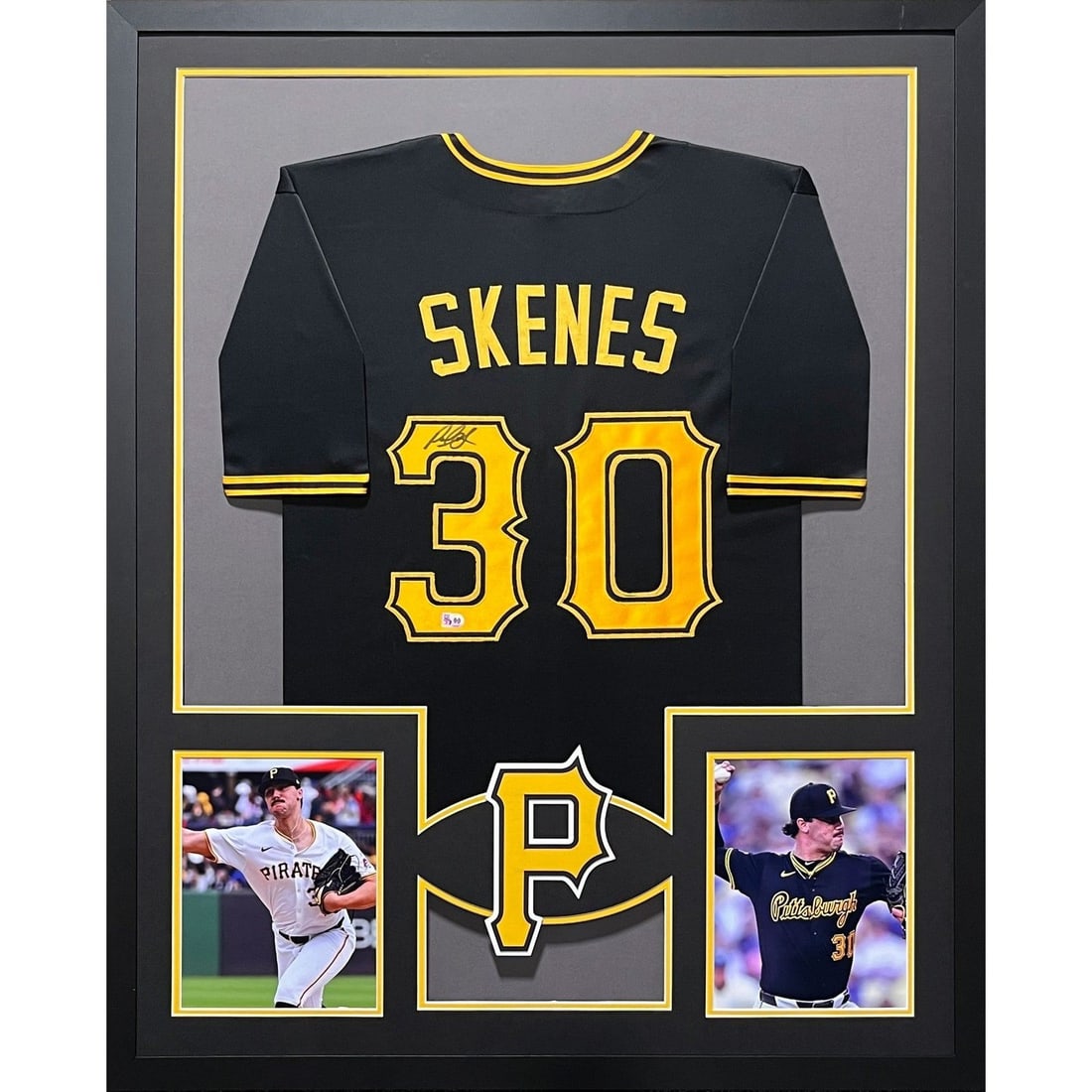 Paul Skenes Autographed Framed Pirates Jersey with MLB COA: Paul Skenes Autographed Framed Pirates Jersey with MLB COA This is an autographed black jersey of Paul Skenes, framed and ready for display. The jersey is authenticated by the MLB, ensuring its authen