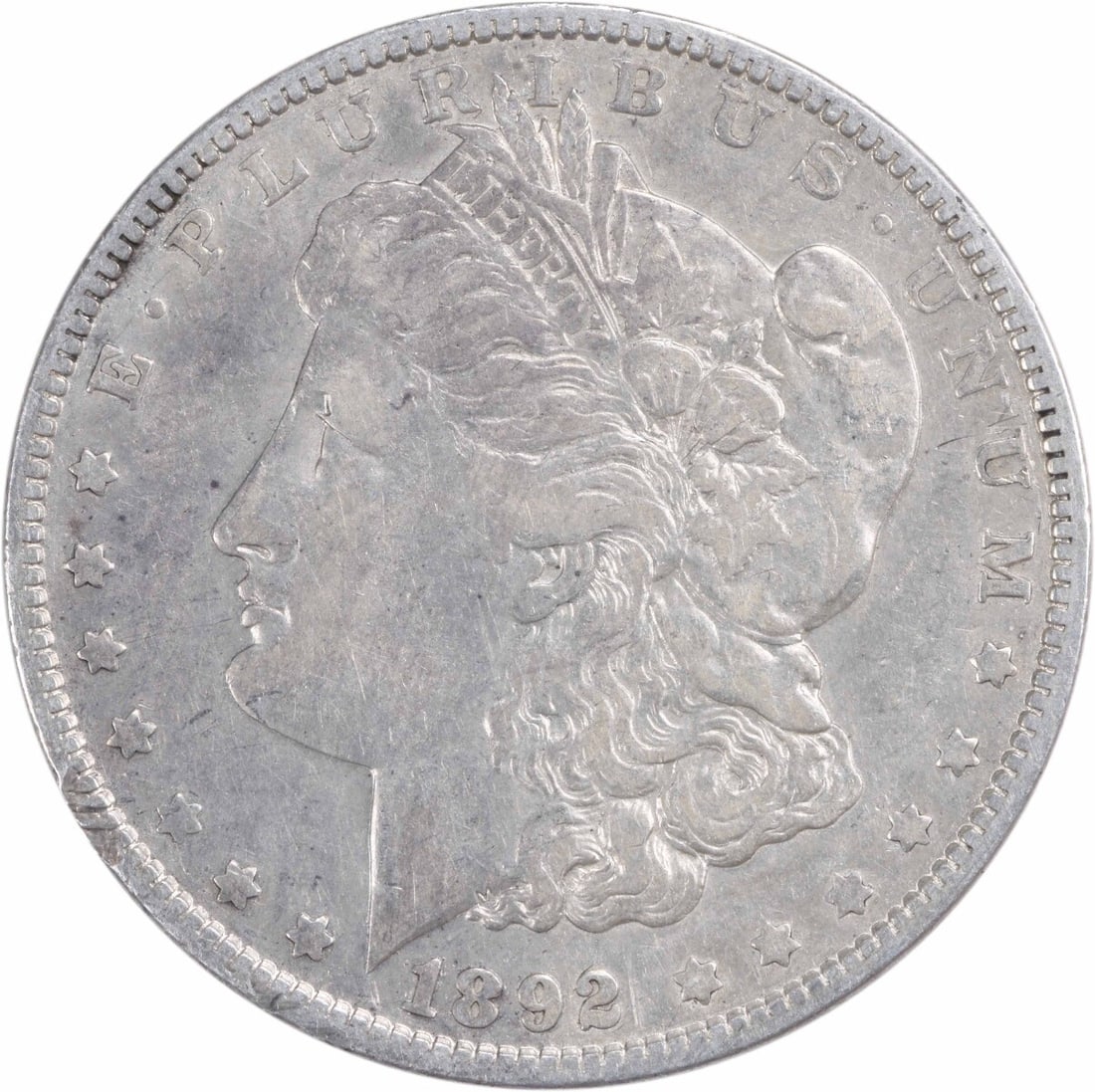1892-O Morgan Silver Dollar Uncertified XF Coin 90% Silver: 1892-O Morgan Silver Dollar Uncertified XF Coin 90% Silver This 1892-O Morgan Silver Dollar is a remarkable piece of history, featuring a classic design by George T. Morgan. Struck in New Orleans, thi