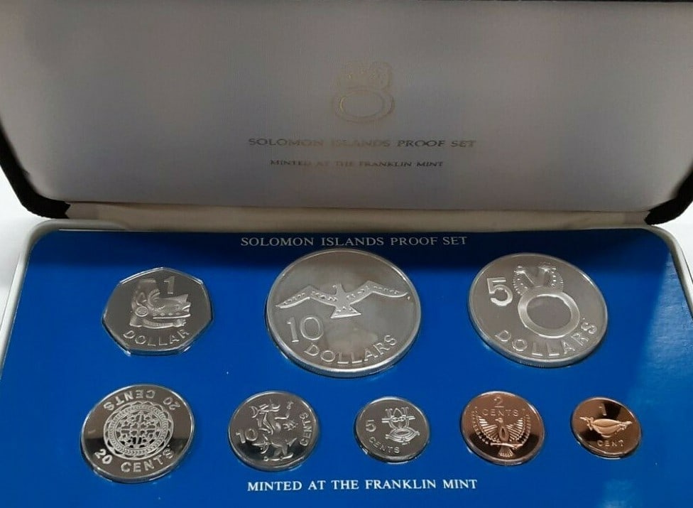 1979 Solomon Islands 8-Coin Proof Set Silver $5 and $10 by Franklin Mint with COA: 1979 Solomon Islands 8-Coin Proof Set Silver $5 and $10 by Franklin Mint with COA This 1979 Solomon Islands proof set includes eight coins, featuring sterling silver $5 and $10 coins. The set was stru