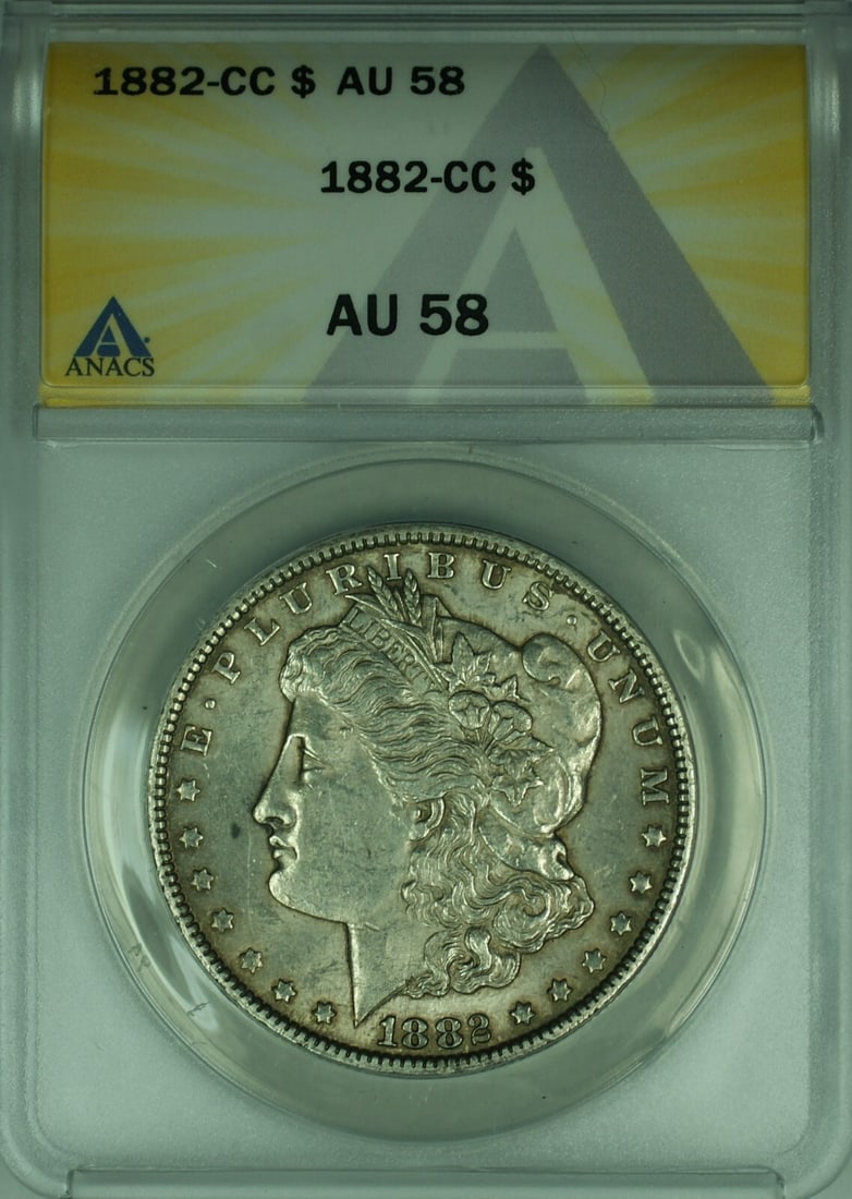 ANACS AU-58 1882-CC Carson City Morgan Silver Dollar $1 Coin: ANACS AU-58 1882-CC Carson City Morgan Silver Dollar $1 Coin This 1882-CC Morgan Silver Dollar is a certified collectible coin graded AU-58 by ANACS. Minted in Carson City, it features the classic Mor