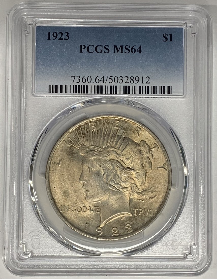 PCGS MS 64 1923 Peace Dollar Silver Coin With Toning: PCGS MS 64 1923 Peace Dollar Silver Coin With Toning This is a 1923 Peace Silver Dollar coin from the United States. The coin is composed of silver, has a denomination of $1, and is graded MS 64 by PC