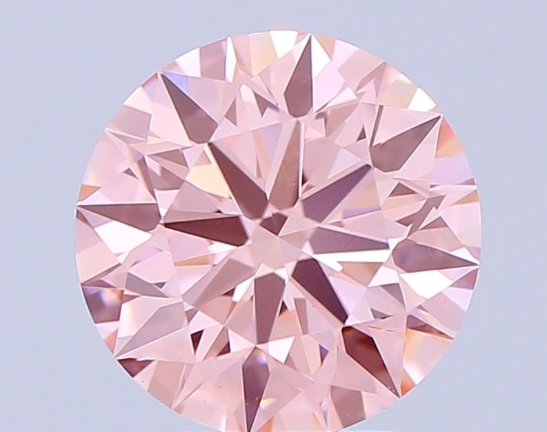 Ideal Loose Diamond - ROUND 2.46ct Fancy Vivid Pink VS1: Ideal Loose Diamond - ROUND 2.46ct Fancy Vivid Pink VS1 Source: This is a real non-mined Diamond that has been grown in a lab Shape: ROUND Carats: 2.46 Color: Fancy Vivid Pink Certification: IGI Video