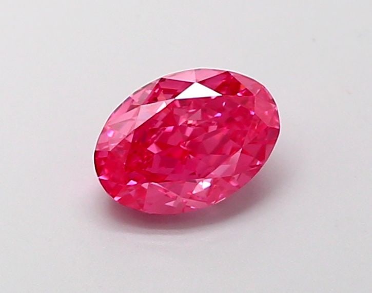 Loose Diamond - OVAL 1.08ct Fancy Vivid Pink VVS2: Loose Diamond - OVAL 1.08ct Fancy Vivid Pink VVS2 Source: This is a real non-mined Diamond that has been grown in a lab Shape: OVAL Carats: 1.08 Color: Fancy Vivid Pink Certification: IGI Video: