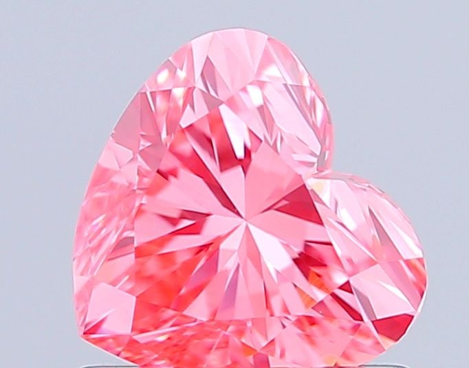 Loose Diamond - HEART 0.86ct Fancy Vivid Pink VS1: Loose Diamond - HEART 0.86ct Fancy Vivid Pink VS1 Source: This is a real non-mined Diamond that has been grown in a lab Shape: HEART Carats: 0.86 Color: Fancy Vivid Pink Certification: IGI Video: