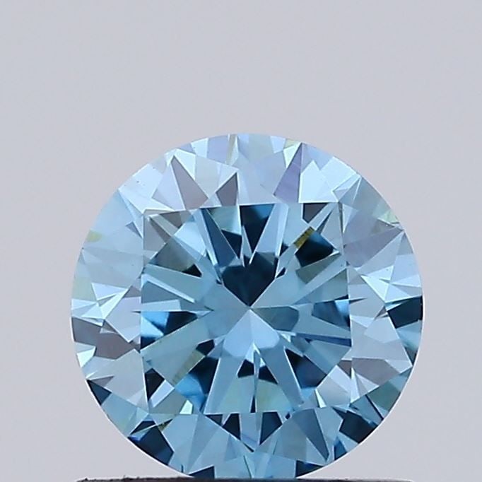 Loose Diamond - ROUND 0.9ct Fancy Vivid Blue VVS2: Loose Diamond - ROUND 0.9ct Fancy Vivid Blue VVS2 Source: This is a real non-mined Diamond that has been grown in a lab Shape: ROUND Carats: 0.9 Color: Fancy Vivid Blue Certification: NONE Video: