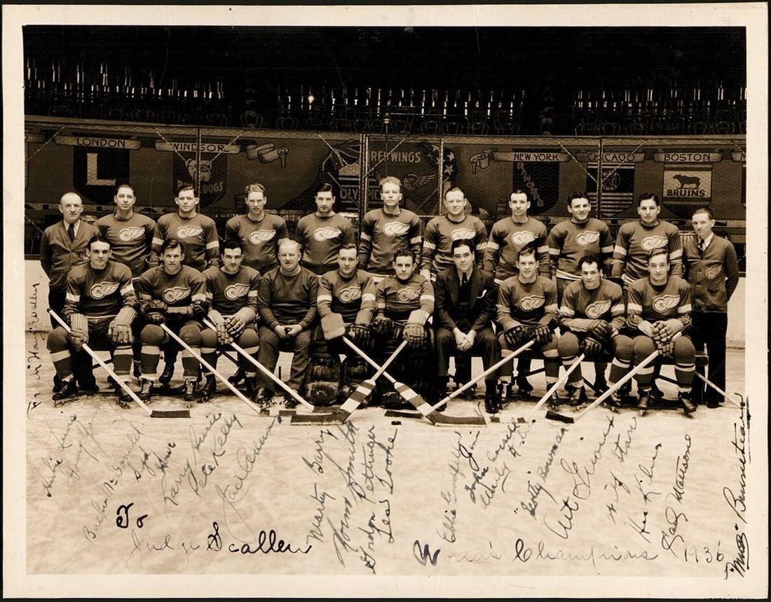1936 Detroit Red Wings Stanley Cup Champs Team-Signed Photo PSA LOA 20+ Signatures: 1936 Detroit Red Wings Stanley Cup Champs Team-Signed Photo PSA LOA 20+ Signatures This remarkable 1936 Stanley Cup Champion Detroit Red Wings team-signed photograph showcases over 20 signatures from