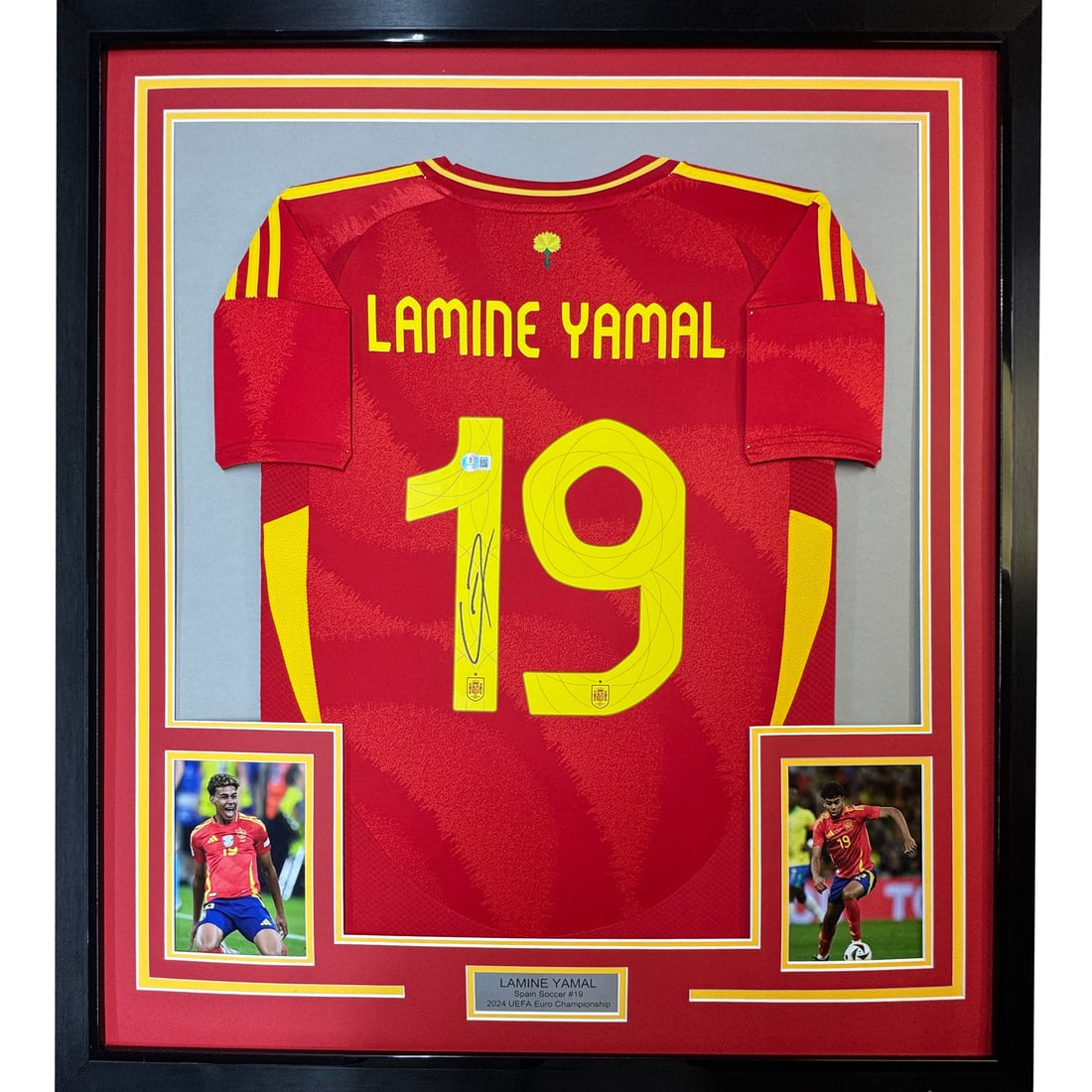 Framed Lamine Yamal Spain Jersey Signed with BAS COA: Framed Lamine Yamal Spain Jersey Signed with BAS COA Celebrate your passion for soccer with this professionally framed and autographed Lamine Yamal Spain red soccer jersey. Measuring 35x39 inches, thi