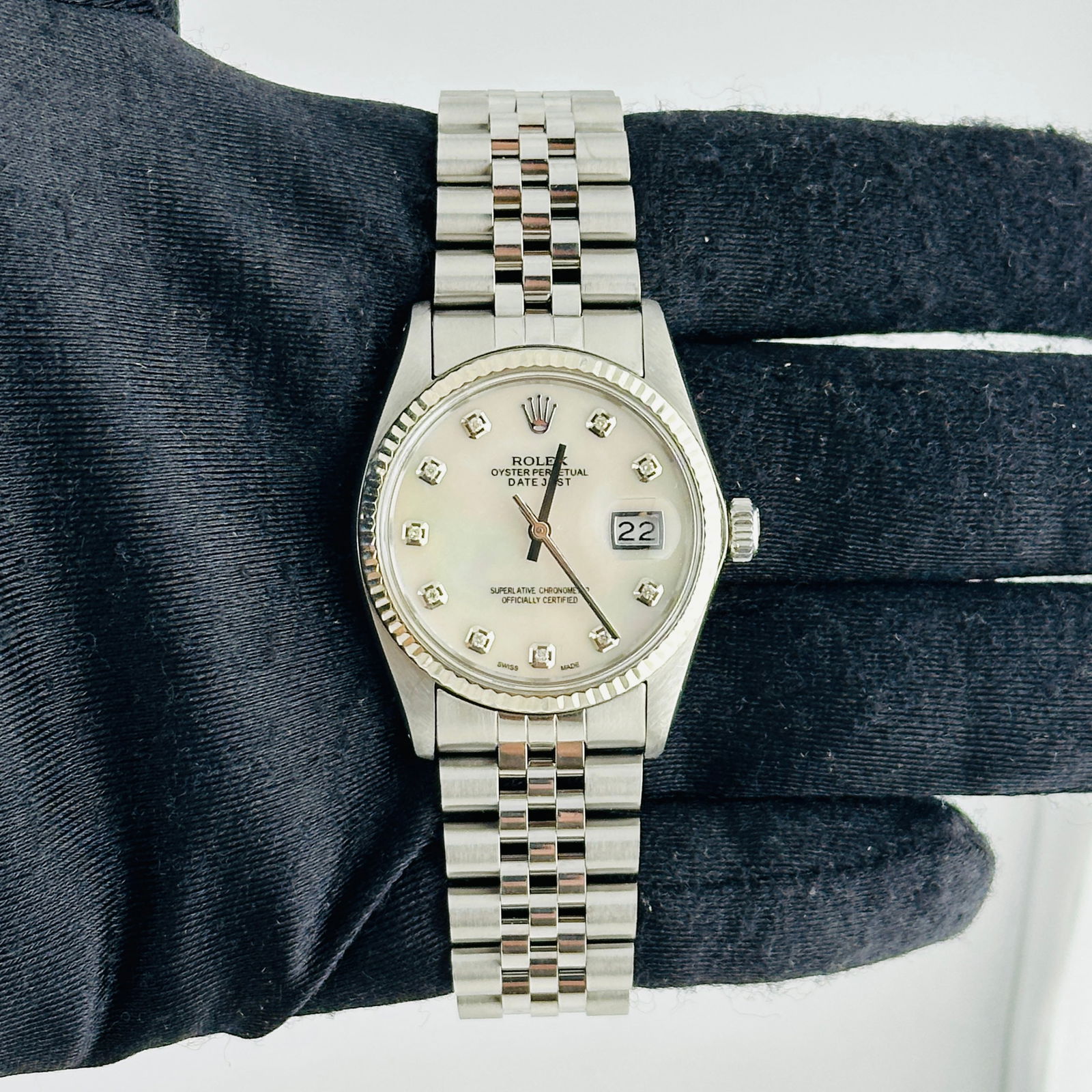 White MOP Diamond Dial Rolex Datejust Jubilee Bracelet Ref 16014 Aftermarket: White MOP Diamond Dial Rolex Datejust Jubilee Bracelet Ref 16014 Aftermarket This is a men's Rolex Datejust watch, reference number 16014. It features an aftermarket white mother of pearl dial set wit