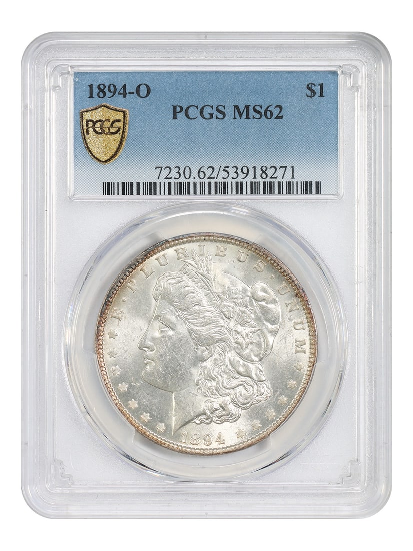 PCGS MS62 1894-O Morgan Silver Dollar New Orleans Mint: PCGS MS62 1894-O Morgan Silver Dollar New Orleans Mint This is an 1894-O Morgan Dollar, graded MS62 by PCGS. This uncirculated coin, minted in New Orleans, features mildly toned rims that lighten towa