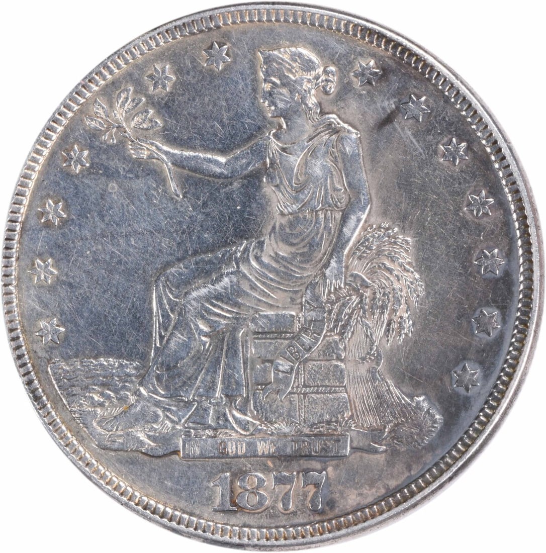 1877 Trade Silver Dollar AU Uncertified Coin by William Barber: 1877 Trade Silver Dollar AU Uncertified Coin by William Barber This 1877 Trade Silver Dollar is a stunning piece of numismatic history. Struck in Philadelphia, this coin features a composition of 90%
