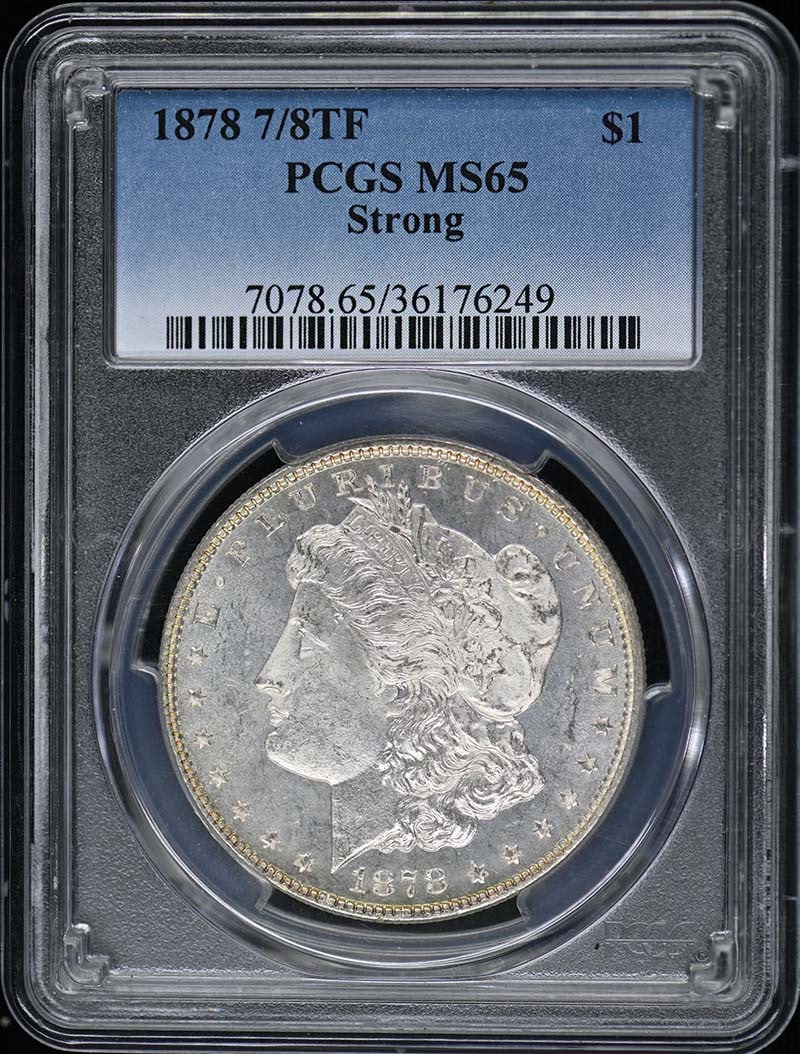 1878 Morgan Dollar $1 PCGS MS65 Uncirculated Philadelphia Mint: 1878 Morgan Dollar $1 PCGS MS65 Uncirculated Philadelphia Mint This 1878 Morgan Dollar is a stunning example of early American coinage, featuring a strong strike and exceptional detail. Graded MS65 by