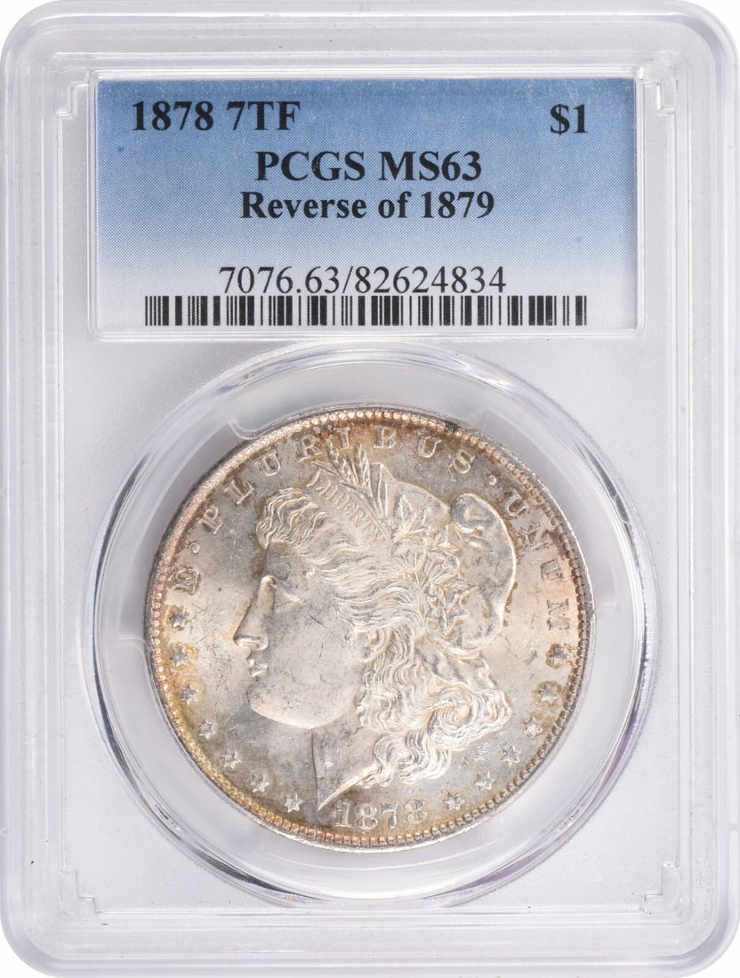 1878 Morgan Silver Dollar MS63 PCGS 90% Silver Coin by George T. Morgan: 1878 Morgan Silver Dollar MS63 PCGS 90% Silver Coin by George T. Morgan This 1878 Morgan Silver Dollar features the renowned design by George T. Morgan and is graded MS63 by PCGS. With a composition o
