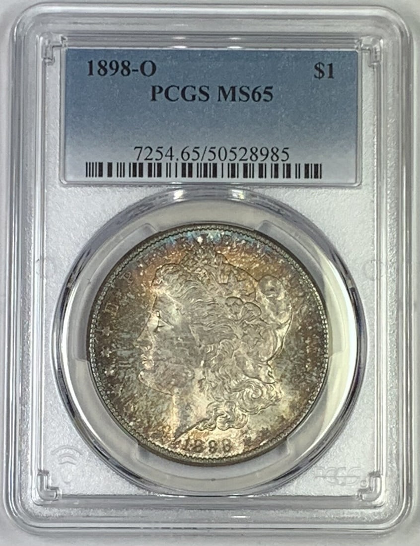 PCGS MS 65 1898-O Morgan Silver Dollar with Toning: PCGS MS 65 1898-O Morgan Silver Dollar with Toning This 1898-O Morgan Silver Dollar is a collectible coin from the United States, featuring a toned appearance. It is composed of silver and has been ce