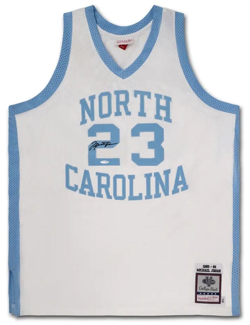 Michael Jordan Autographed North Carolina Jersey Mitchell & Ness Upper Deck Certified: Michael Jordan Autographed North Carolina Jersey Mitchell & Ness Upper Deck Certified This authentic Mitchell & Ness jersey is a must-have for any basketball fan, especially those who revere the legac