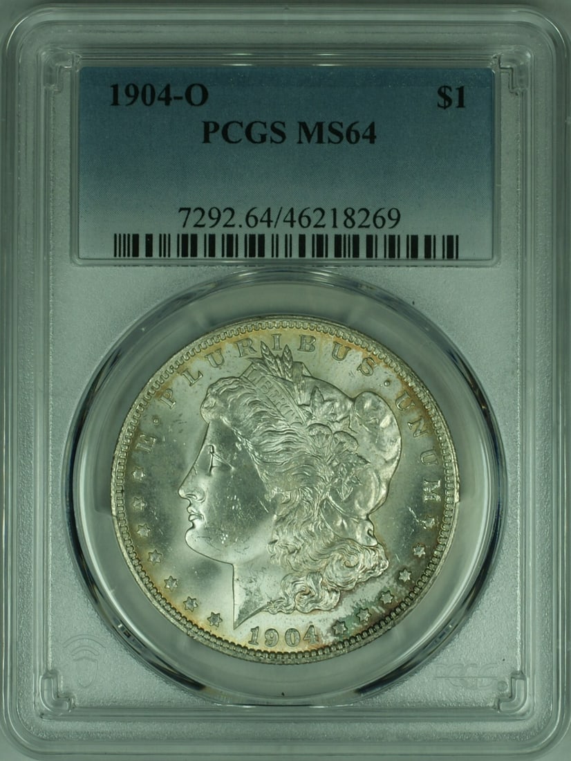 PCGS MS-64 1904-O Morgan Dollar Uncirculated Silver Coin: PCGS MS-64 1904-O Morgan Dollar Uncirculated Silver Coin This is a 1904-O Morgan Silver Dollar coin, certified by PCGS with a grade of MS-64. It is an uncirculated coin struck at the New Orleans Mint,