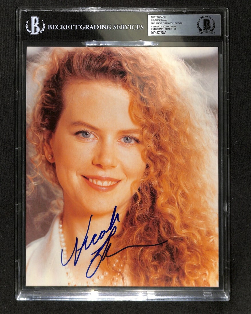 Nicole Kidman Vintage Signed 8x10 Photo Auto Grade 10 Beckett: Nicole Kidman Vintage Signed 8x10 Photo Auto Grade 10 Beckett This is a vintage autographed 8x10 color photograph of Nicole Kidman, featuring her older style signature signed in blue permanent marker.