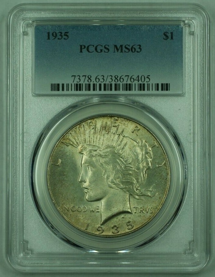 PCGS MS-63 1935 Peace Dollar Silver Coin Toned Philadelphia Issue: PCGS MS-63 1935 Peace Dollar Silver Coin Toned Philadelphia Issue This 1935 Peace Silver Dollar was minted in Philadelphia and is certified by PCGS with a grade of MS-63. The coin is uncirculated and
