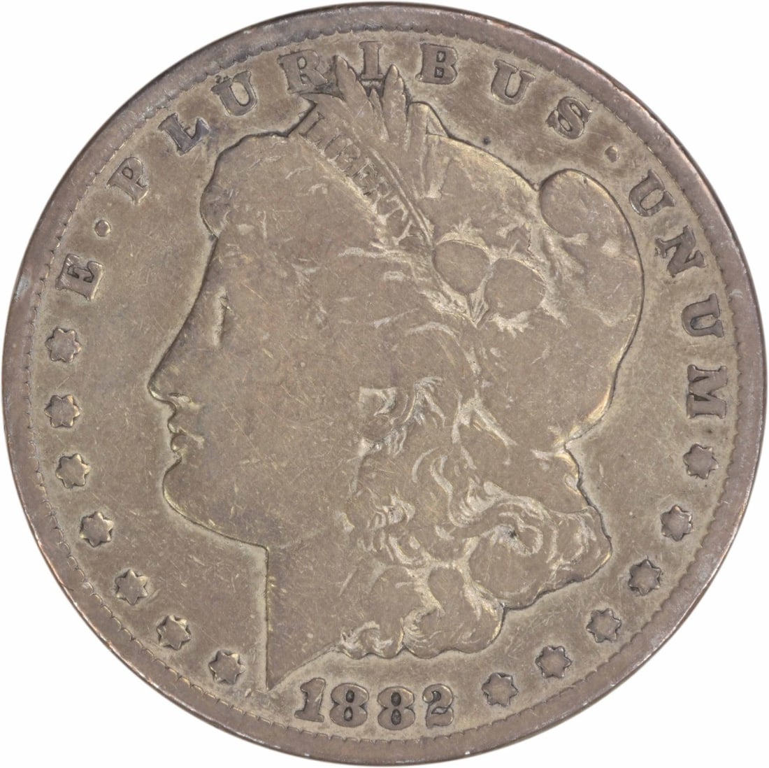 1882 CC Morgan Silver Dollar VG Uncertified 90% Silver Coin: 1882 CC Morgan Silver Dollar VG Uncertified 90% Silver Coin This 1882-CC Morgan Silver Dollar is a notable piece from the Carson City Mint, showcasing the craftsmanship of designer George T. Morgan. S