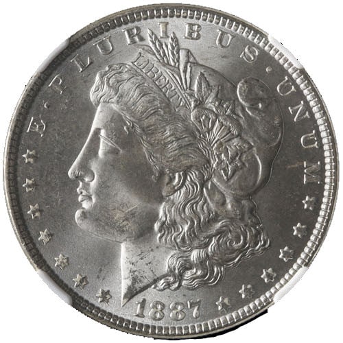 1887-P Morgan Silver Dollar NGC MS65 Blast White Uncirculated Gem: 1887-P Morgan Silver Dollar NGC MS65 Blast White Uncirculated Gem This stunning 1887-P Morgan Silver Dollar is graded NGC MS65, showcasing exceptional quality with a blast white finish and remarkable