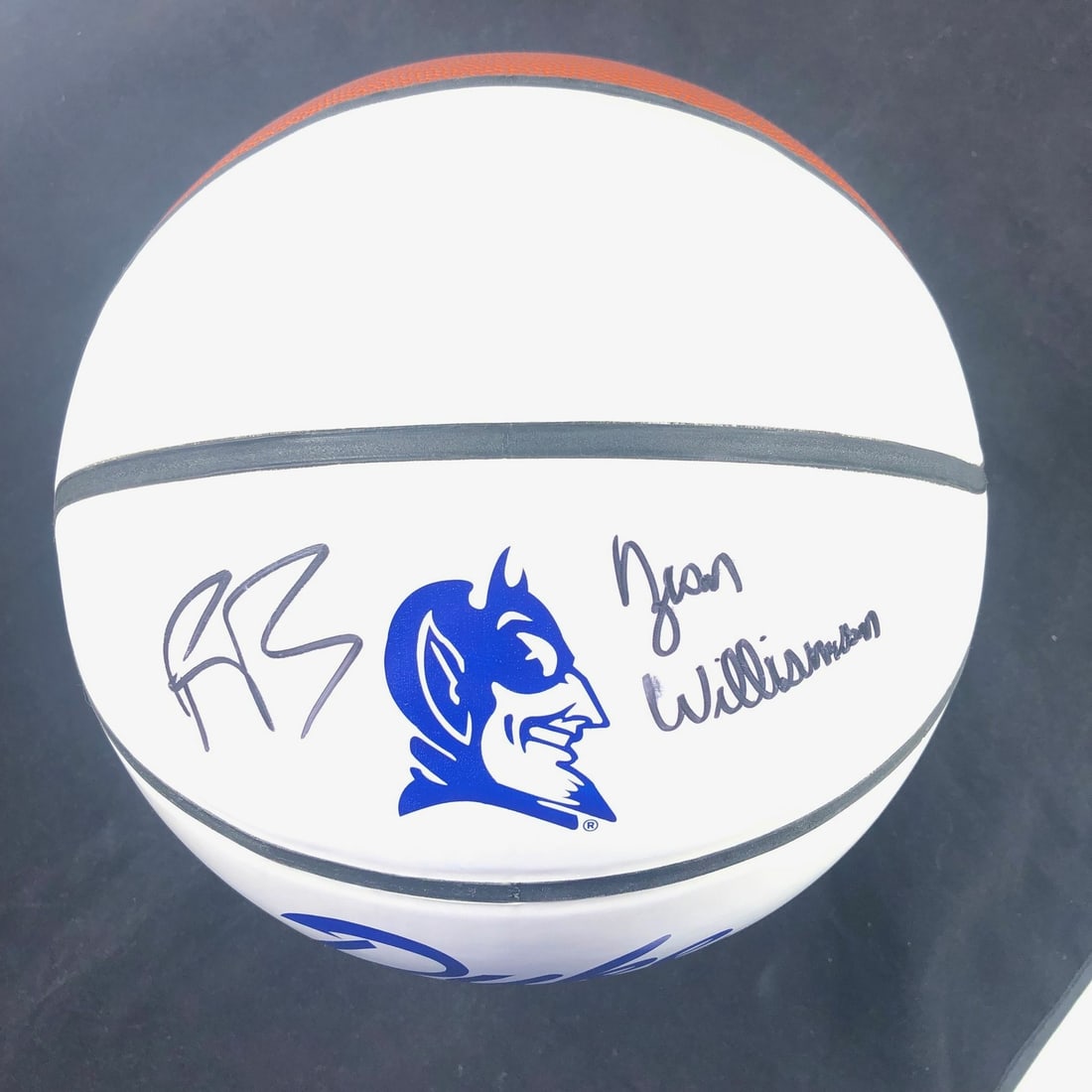 Duke Basketball Signed by Zion Williamson RJ Barrett PSA/DNA: Duke Basketball Signed by Zion Williamson RJ Barrett PSA/DNA This is an original Duke University basketball signed by NBA stars Zion Williamson and RJ Barrett, both of whom made their mark while playi