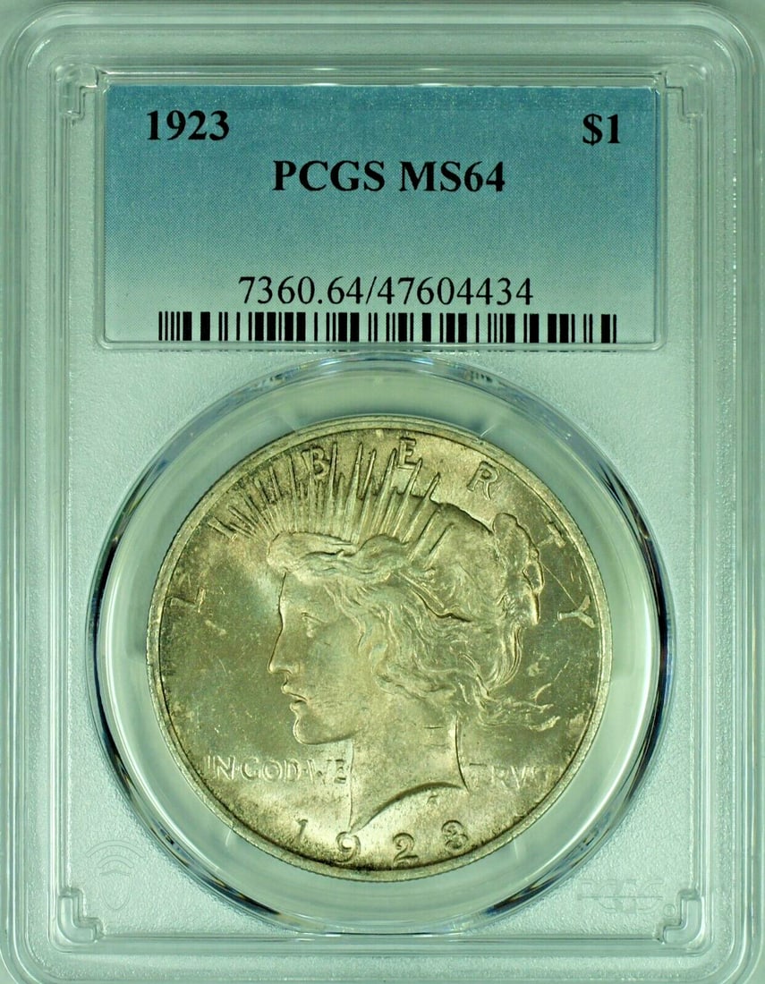 PCGS MS 64 1923 Peace Dollar Silver Coin with Toning: PCGS MS 64 1923 Peace Dollar Silver Coin with Toning This is a 1923 Peace Silver Dollar $1 coin from the United States, featuring a toned appearance. The coin is uncirculated and has been graded MS 64