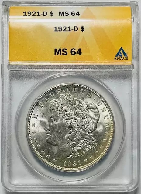 1921 D Morgan Silver Dollar ANACS MS-64 Uncirculated Silver Coin: 1921 D Morgan Silver Dollar ANACS MS-64 Uncirculated Silver Coin This 1921 D Morgan Silver Dollar is a stunning example of American coinage, certified by ANACS with a grade of MS-64. Composed of high-