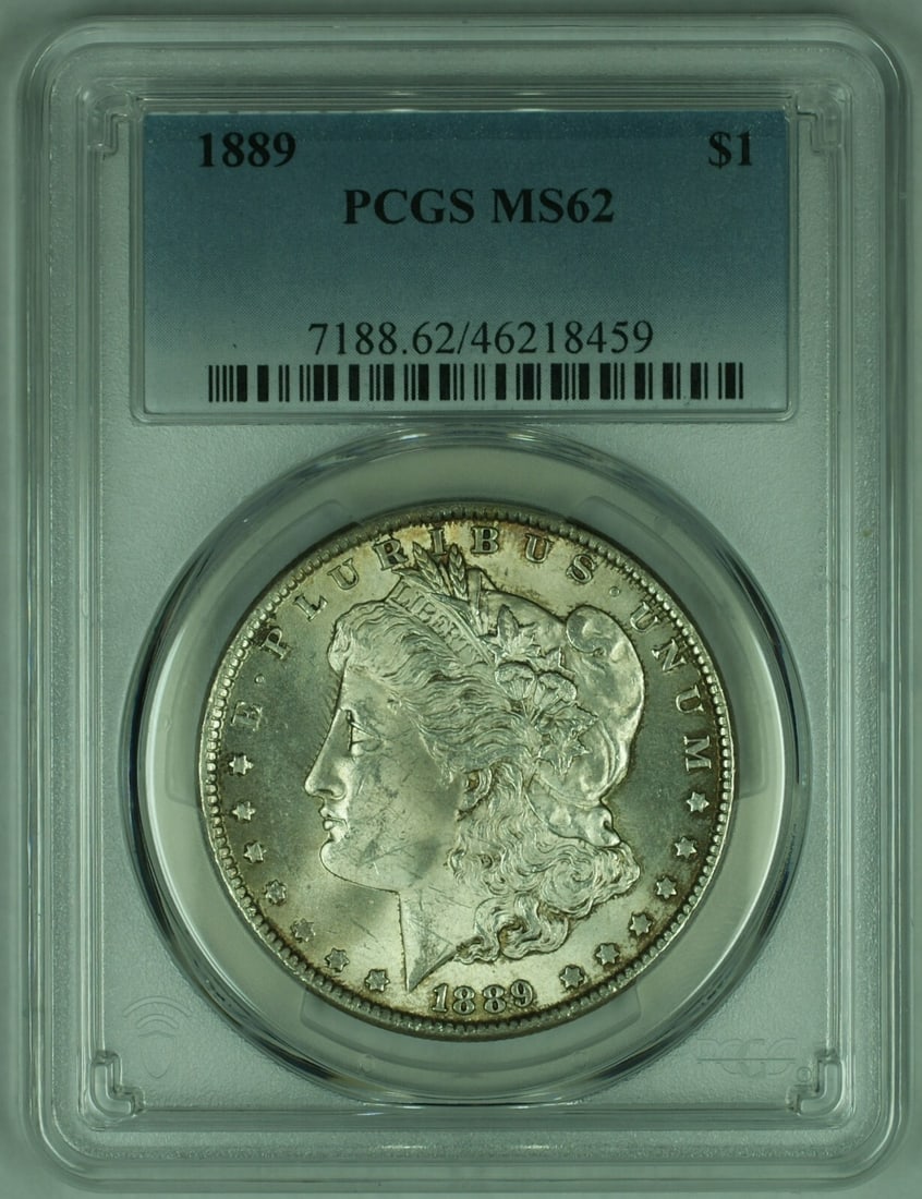 PCGS MS-62 1889 Morgan Silver Dollar Certified US Coin: PCGS MS-62 1889 Morgan Silver Dollar Certified US Coin This is an 1889 Morgan Silver Dollar graded MS-62 by PCGS. The coin is uncirculated, features a silver composition with a fineness of 0.9, and wa