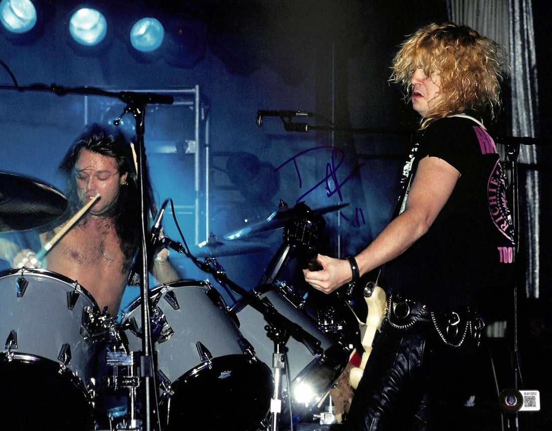 Duff McKagan Signed 11x14 Photograph Guns N Roses Beckett Certified: Duff McKagan Signed 11x14 Photograph Guns N Roses Beckett Certified This stunning 11x14 photograph features Duff McKagan, the original bassist of Guns N' Roses, signed in blue permanent marker. The si