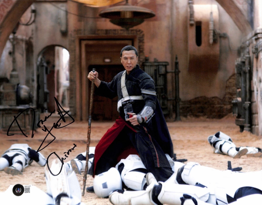 Autographed 11x14 Photo Donnie Yen as Chirrut Imwe Beckett Certified: Autographed 11x14 Photo Donnie Yen as Chirrut Imwe Beckett Certified This is an original 11x14 photograph autographed by Donnie Yen, who portrayed Chirrut Imwe in the movie Rogue One: A Star Wars Stor