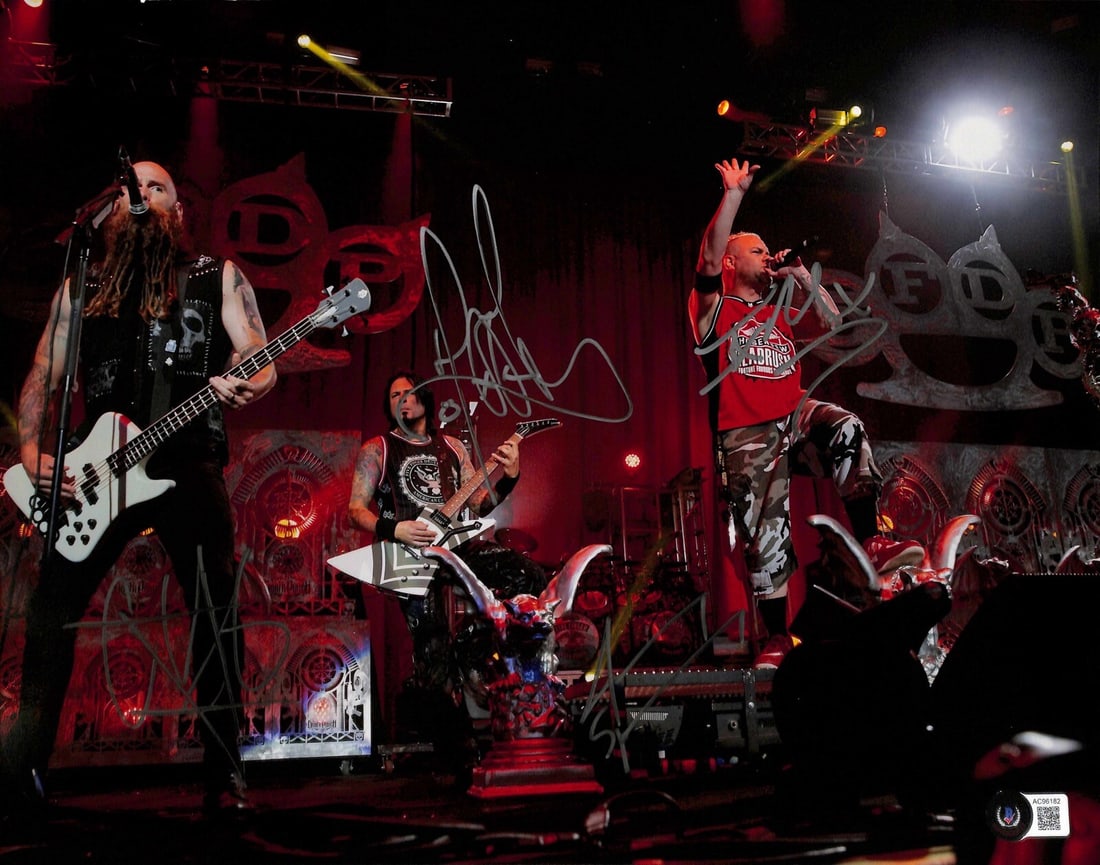 Five Finger Death Punch Signed 11x14 Photo with Beckett LOA: Five Finger Death Punch Signed 11x14 Photo with Beckett LOA This striking 11x14 inch color photograph captures the energy of the band Five Finger Death Punch, featuring autographs from all five member