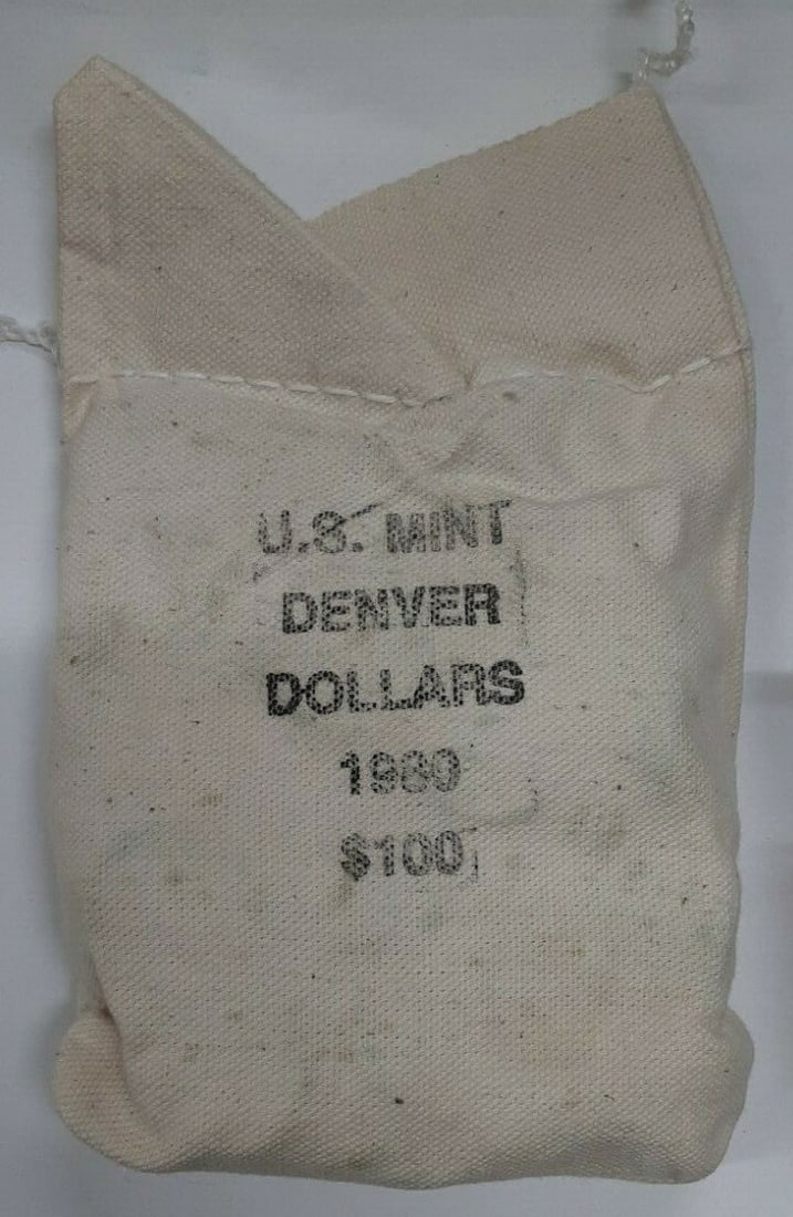Unopened 1980-D Official Mint Bag with Susan B Anthony Dollar Coins: Unopened 1980-D Official Mint Bag with Susan B Anthony Dollar Coins This is an official 1980-D Susan B. Anthony $1 dollar coin bag from the United States Mint, containing uncirculated coins. The bag r