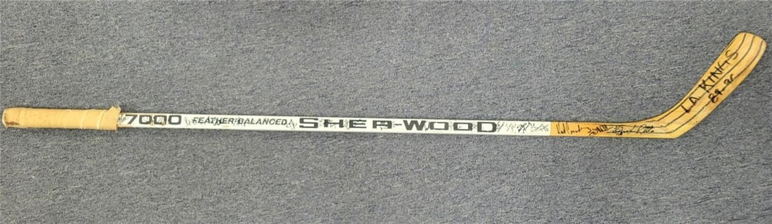 1989-90 LA Kings Team Signed Hockey Stick with 20 Autographs BAS: 1989-90 LA Kings Team Signed Hockey Stick with 20 Autographs BAS This unique hockey stick is a pre-owned piece from the 1989-90 Los Angeles Kings, featuring 20 autographs including that of the legenda