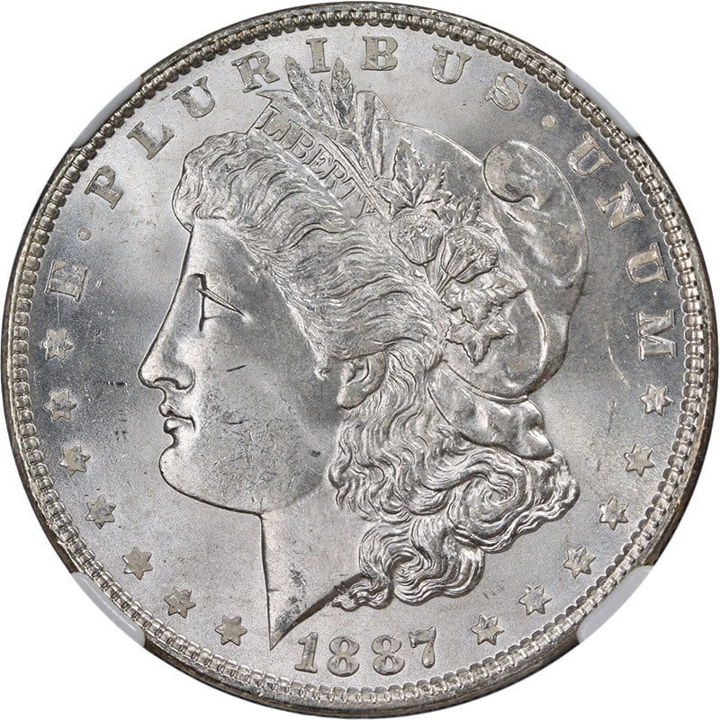 1887-P Morgan Silver Dollar NGC MS66 Blazing Gem Superb Eye Appeal: 1887-P Morgan Silver Dollar NGC MS66 Blazing Gem Superb Eye Appeal This stunning 1887-P Morgan Silver Dollar, graded NGC MS66, is a true collector's gem. It features exceptional eye appeal characteriz