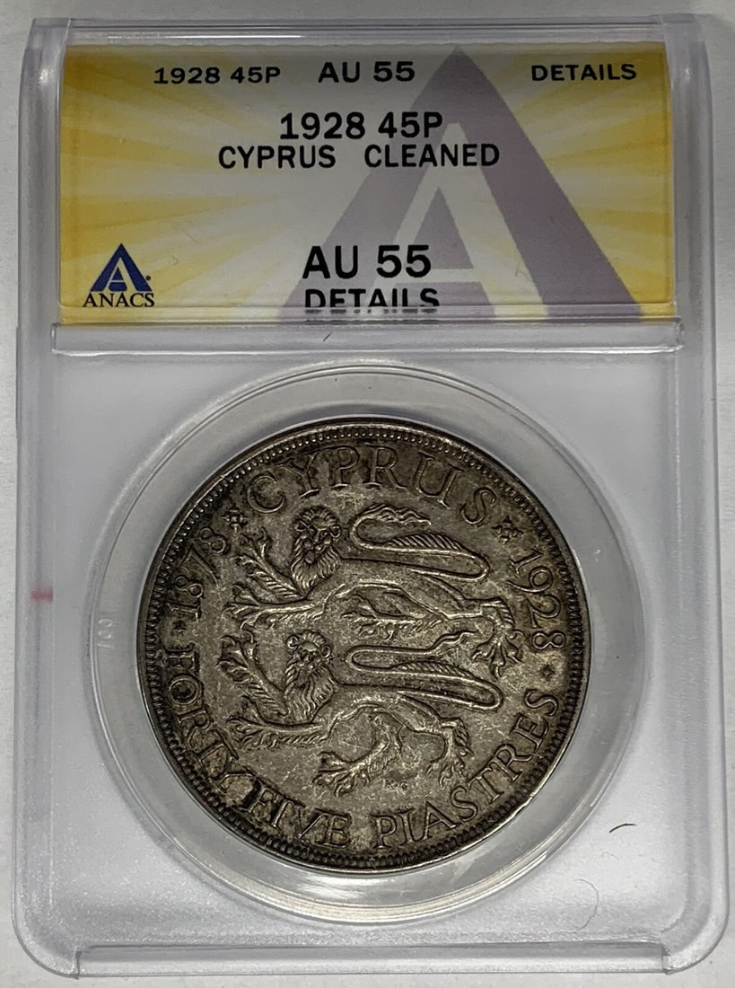 ANACS AU 55 Silver 1928 Cyprus 45 Piastres Coin Toned Cleaned: ANACS AU 55 Silver 1928 Cyprus 45 Piastres Coin Toned Cleaned This 1928 Cyprus 45 Piastres coin is certified by ANACS with a grade of AU 55. The coin is composed of silver and features attractive toni