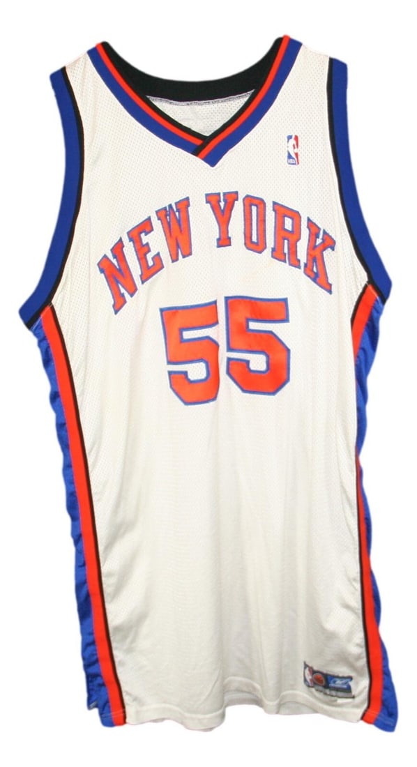 Dikembe Mutombo Game Used 2003 Knicks White Jersey NBA: Dikembe Mutombo Game Used 2003 Knicks White Jersey NBA This is a game-used white basketball jersey worn by Dikembe Mutombo during his time with the New York Knicks. It is officially licensed by the NB