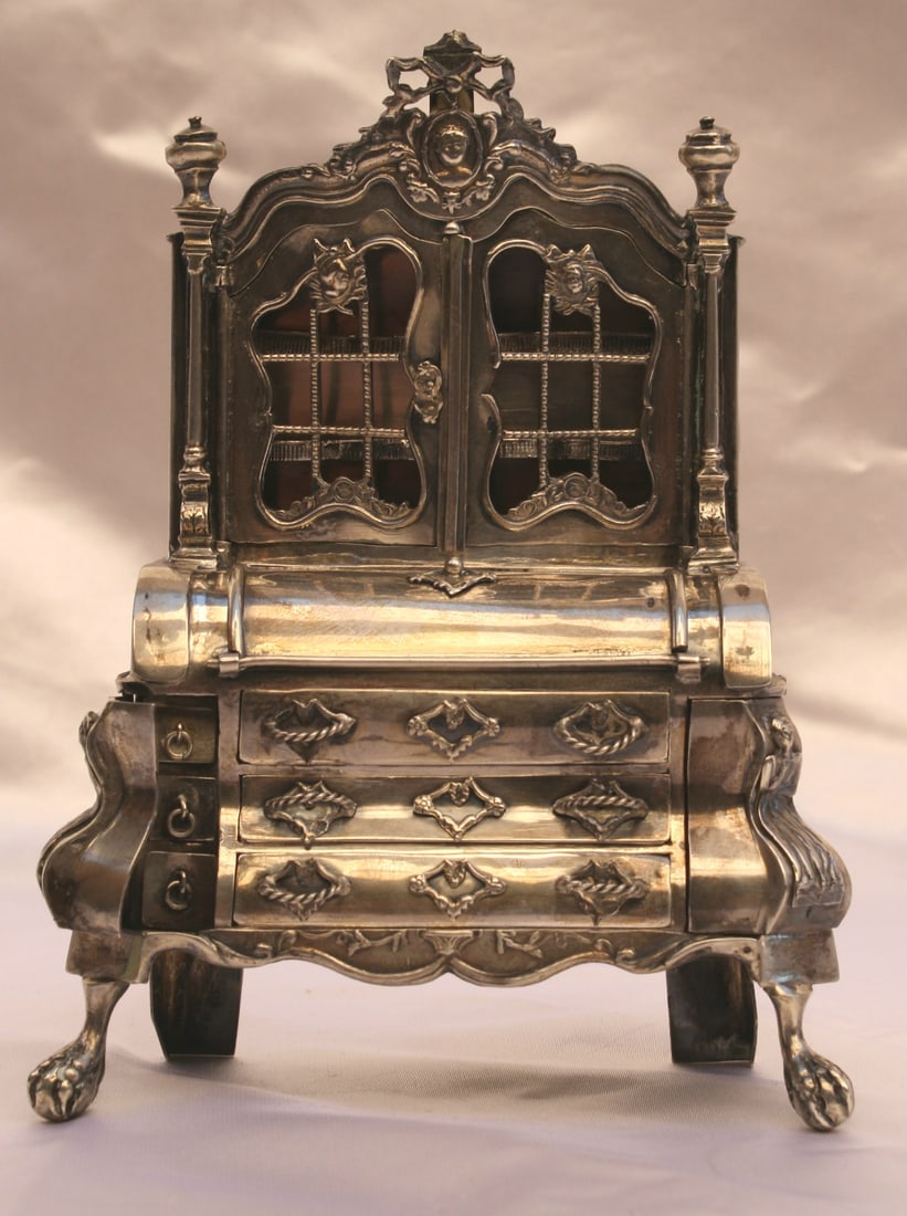 1850 Dutch Sterling Silver Miniature Secretary Cabinet with Claw Feet: 1850 Dutch Sterling Silver Miniature Secretary Cabinet with Claw Feet This exquisite 1850 Dutch sterling silver miniature secretary cabinet showcases remarkable craftsmanship and intricate design. The