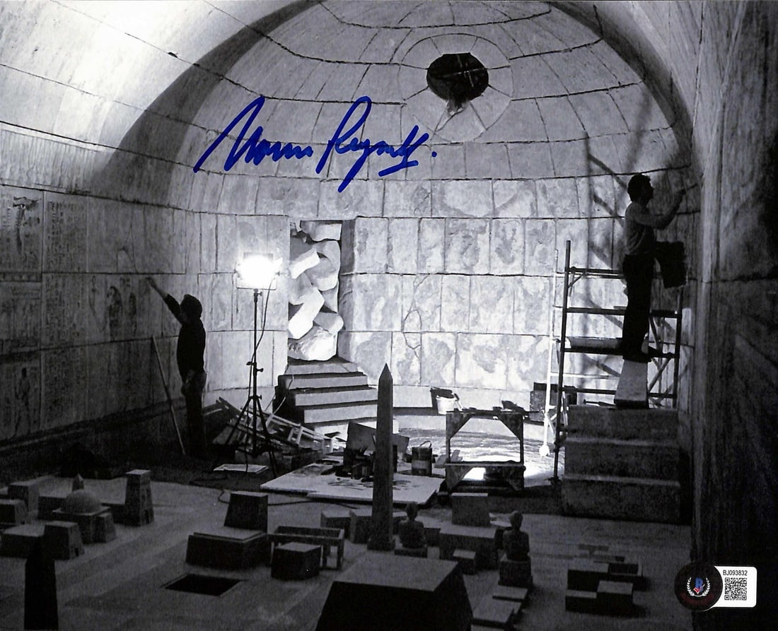 Indiana Jones Tomb Set 8x10 Photo Signed by Oscar Winner Norman Reynolds Beckett Authenticated: Indiana Jones Tomb Set 8x10 Photo Signed by Oscar Winner Norman Reynolds Beckett Authenticated This stunning 8x10 photograph captures a behind-the-scenes moment from the iconic Indiana Jones Tomb set,