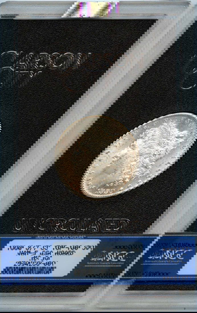 1880 Morgan Dollar VAM-5 NGC MS64 GSA Hoard Top-100: 1880 Morgan Dollar VAM-5 NGC MS64 GSA Hoard Top-100 This 1880 Morgan Dollar is an exceptional example from the GSA Hoard, certified by NGC with a grade of MS64. The coin features the iconic design of