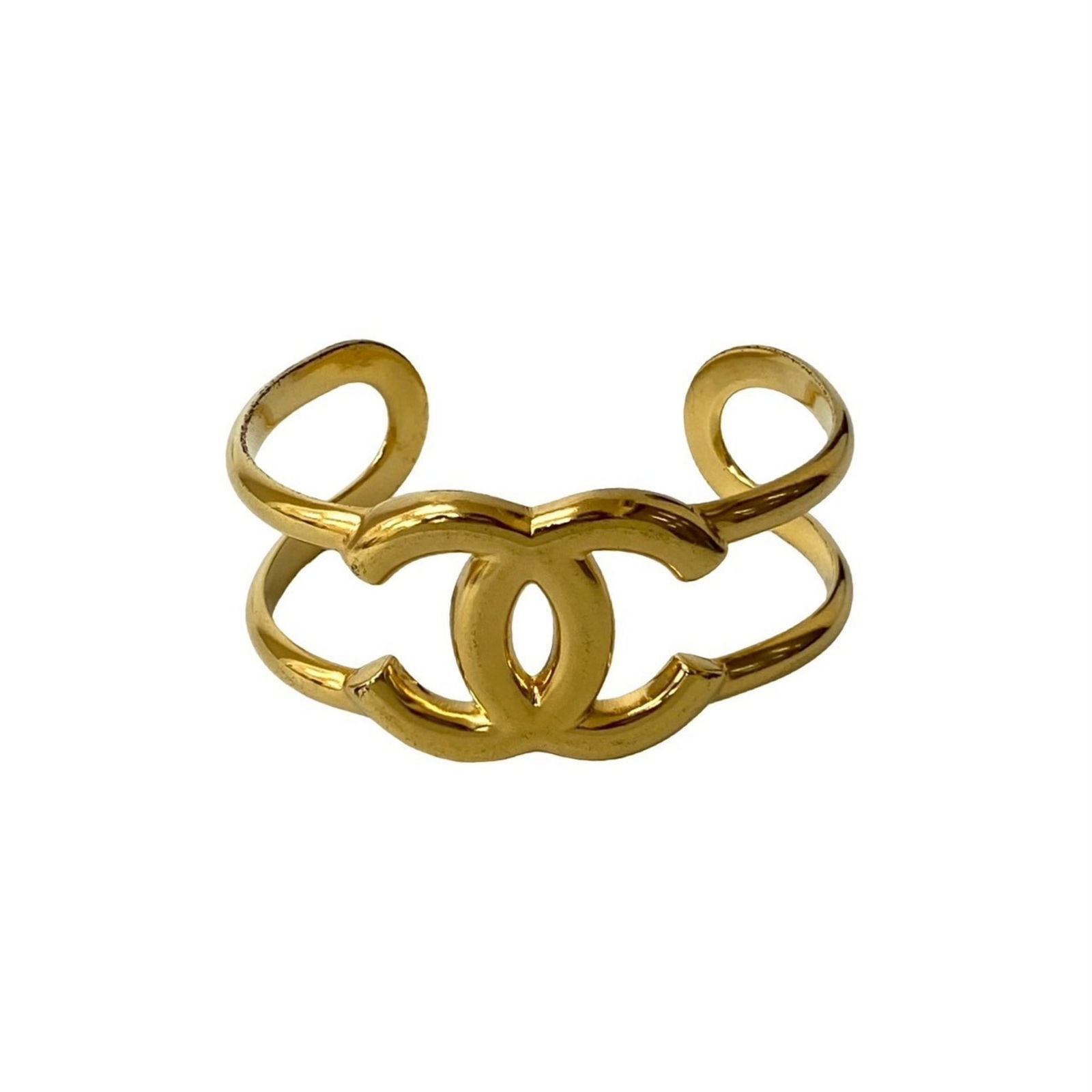 Gold Plated Coco Mark Bracelet by Chanel 17cm Length: Gold Plated Coco Mark Bracelet by Chanel 17cm Length This Chanel Coco Mark bracelet features a gold plated design and measures 17 cm in length. Designed for women, it is crafted in France and showcase