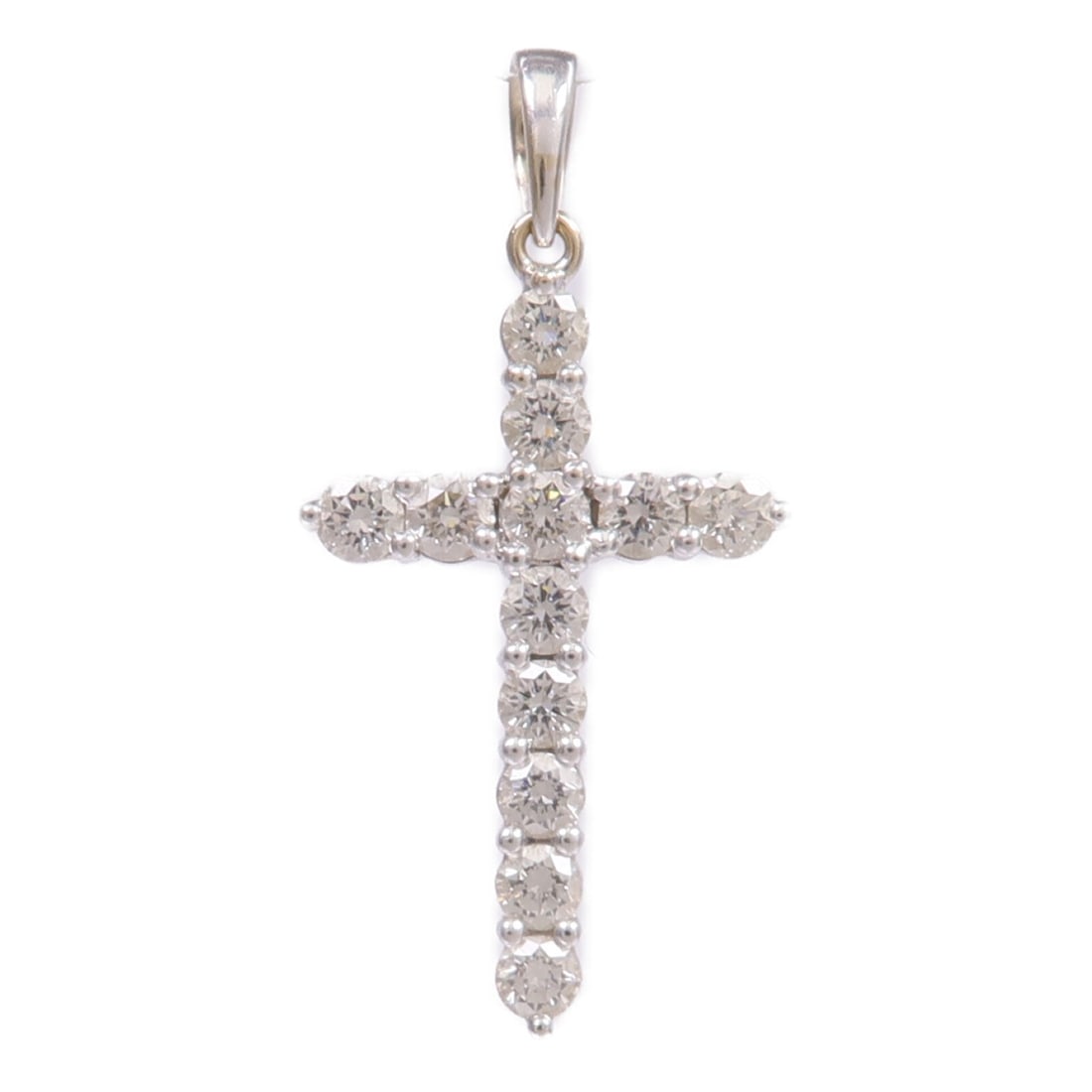 Diamond Pendant in 18K White Gold by JEWELRY: Diamond Pendant in 18K White Gold by JEWELRY This pendant top features a diamond set in 18K white gold. The pendant is designed for regular size wear and showcases a clear stone. The item is in condit