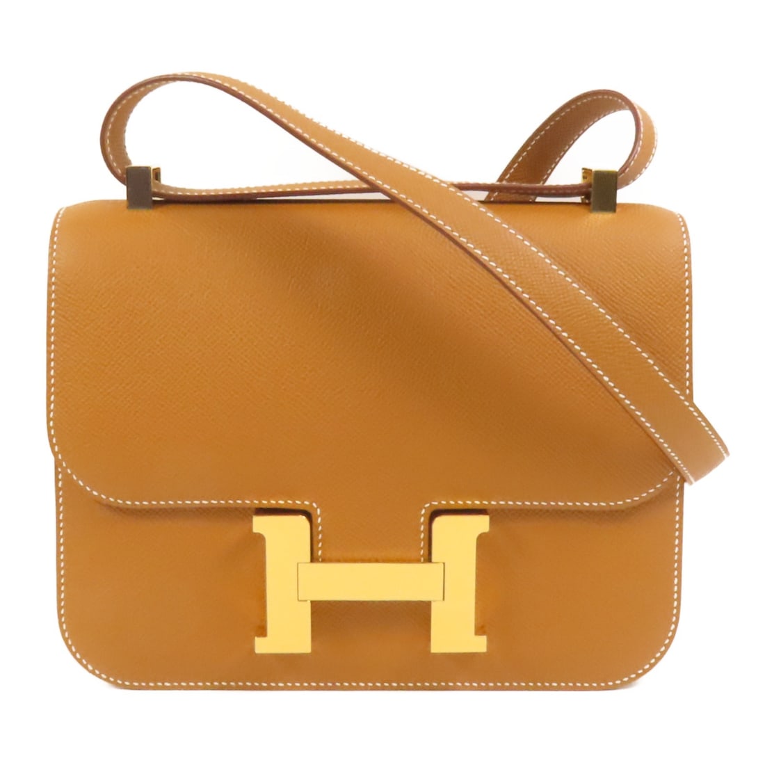 Hermes Constance 24 Epsom Leather Shoulder Bag with Gold Hardware: Hermes Constance 24 Epsom Leather Shoulder Bag with Gold Hardware This Hermes Constance 24 shoulder bag is crafted from Epsom calfskin leather in a brown color. It features gold-tone hardware and a st