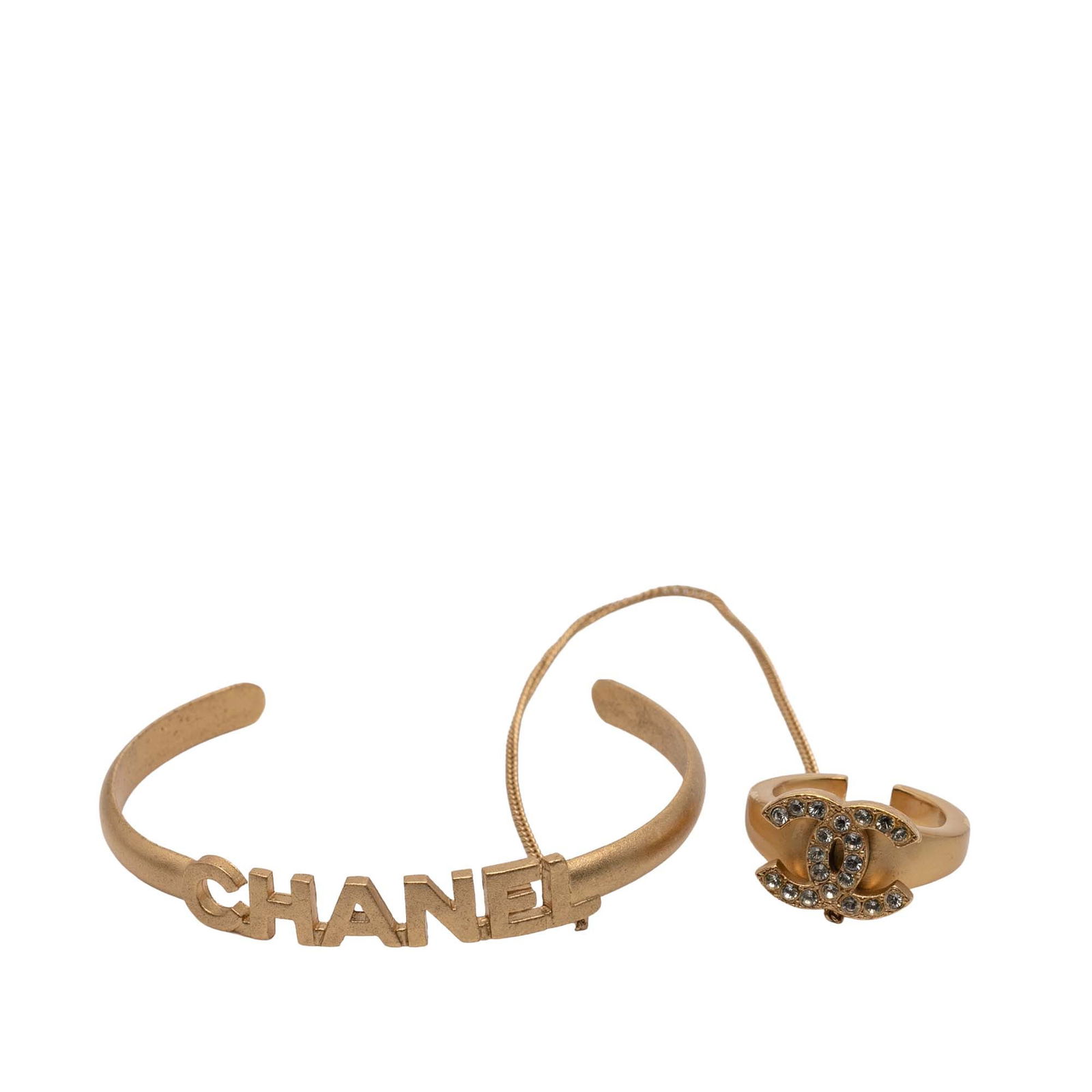 Chanel Gold Plated CC Rhinestone Cuff Bracelet and Ring Set: Chanel Gold Plated CC Rhinestone Cuff Bracelet and Ring Set This exquisite set includes a gold plated cuff bracelet and ring from Chanel, adorned with elegant rhinestone embellishments. The cuff featu