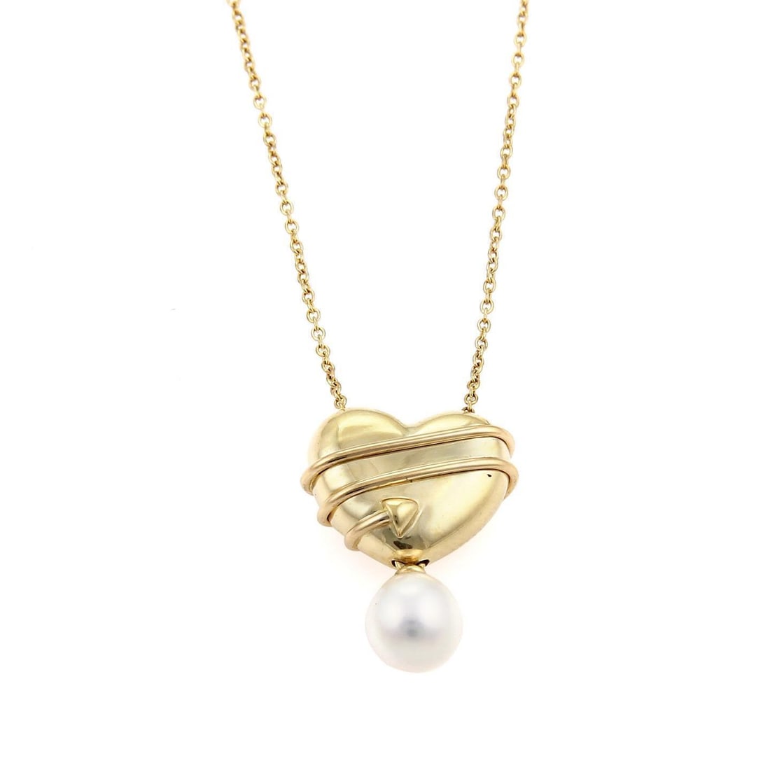 Tiffany & Co. 18k Yellow Gold Heart Pendant with Pearl and Cupid's Arrow: Tiffany & Co. 18k Yellow Gold Heart Pendant with Pearl and Cupid's Arrow Discover the elegance of this authentic Tiffany & Co. Heart Pendant, expertly crafted from 18k yellow gold. The pendant feature